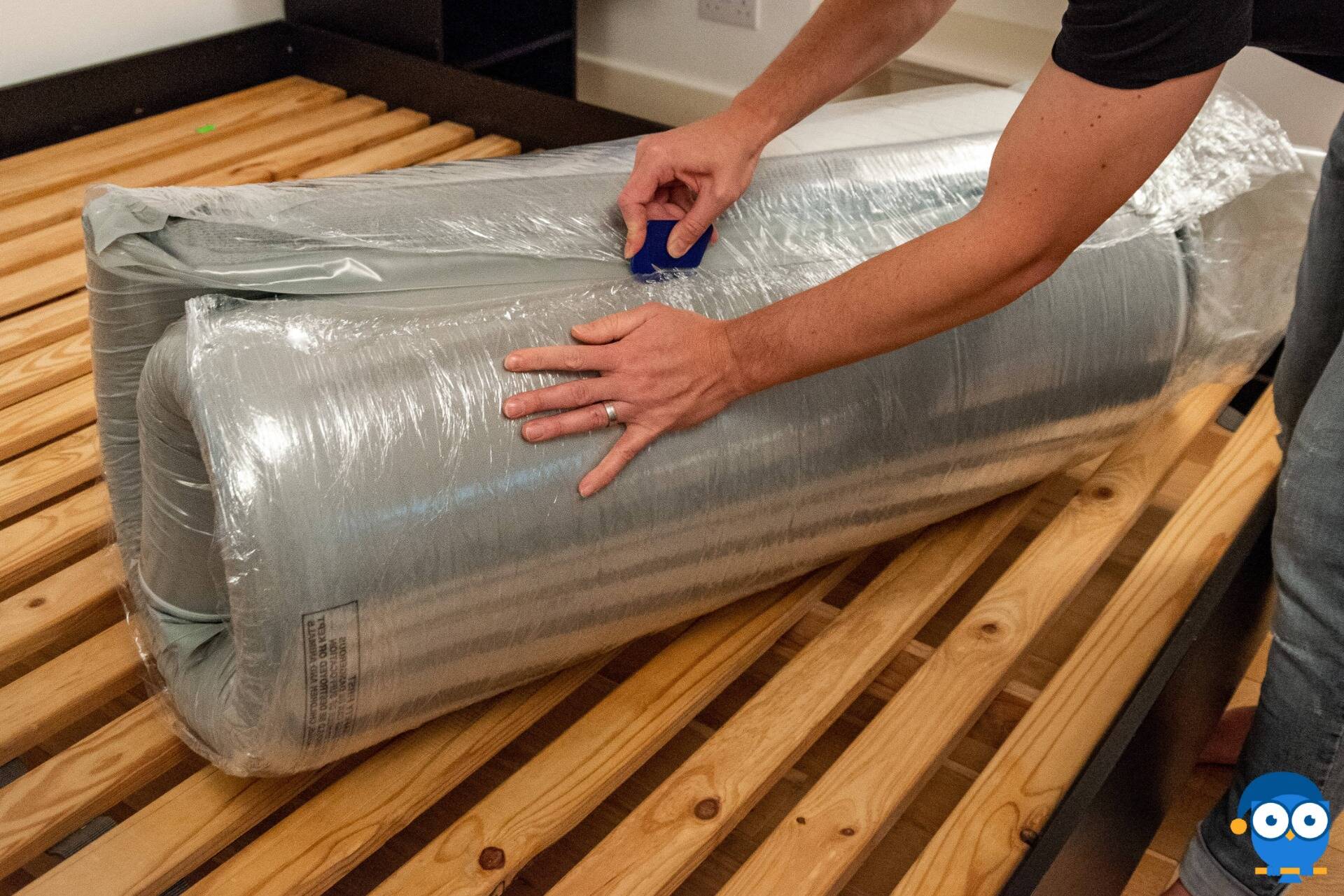 Cutting open the vacuum seal of the Nectar mattress